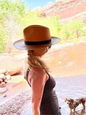 Janessa Leone Wide-Brim Straw Panama Hat in Tan with Black Band